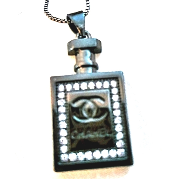 Jewelry - - RARE ONE OF A KIND CHANEL black and silver perfume bottle charm with 18-…